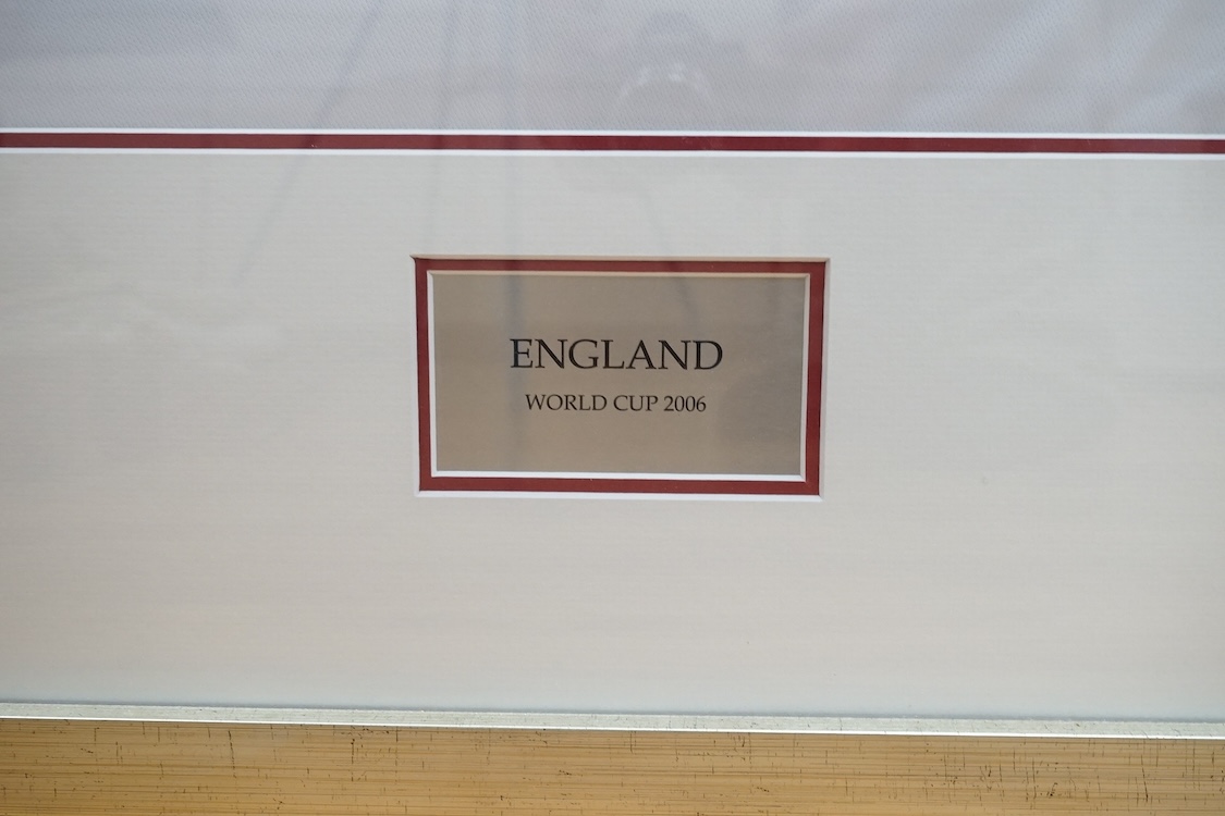 Three signed football shirts, to include England World Cup 2006 and Didier Drogba signed replica CFC shirt, framed. Condition - good